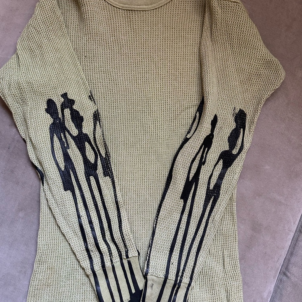 Beige Knit Top with Black Silhouette Design